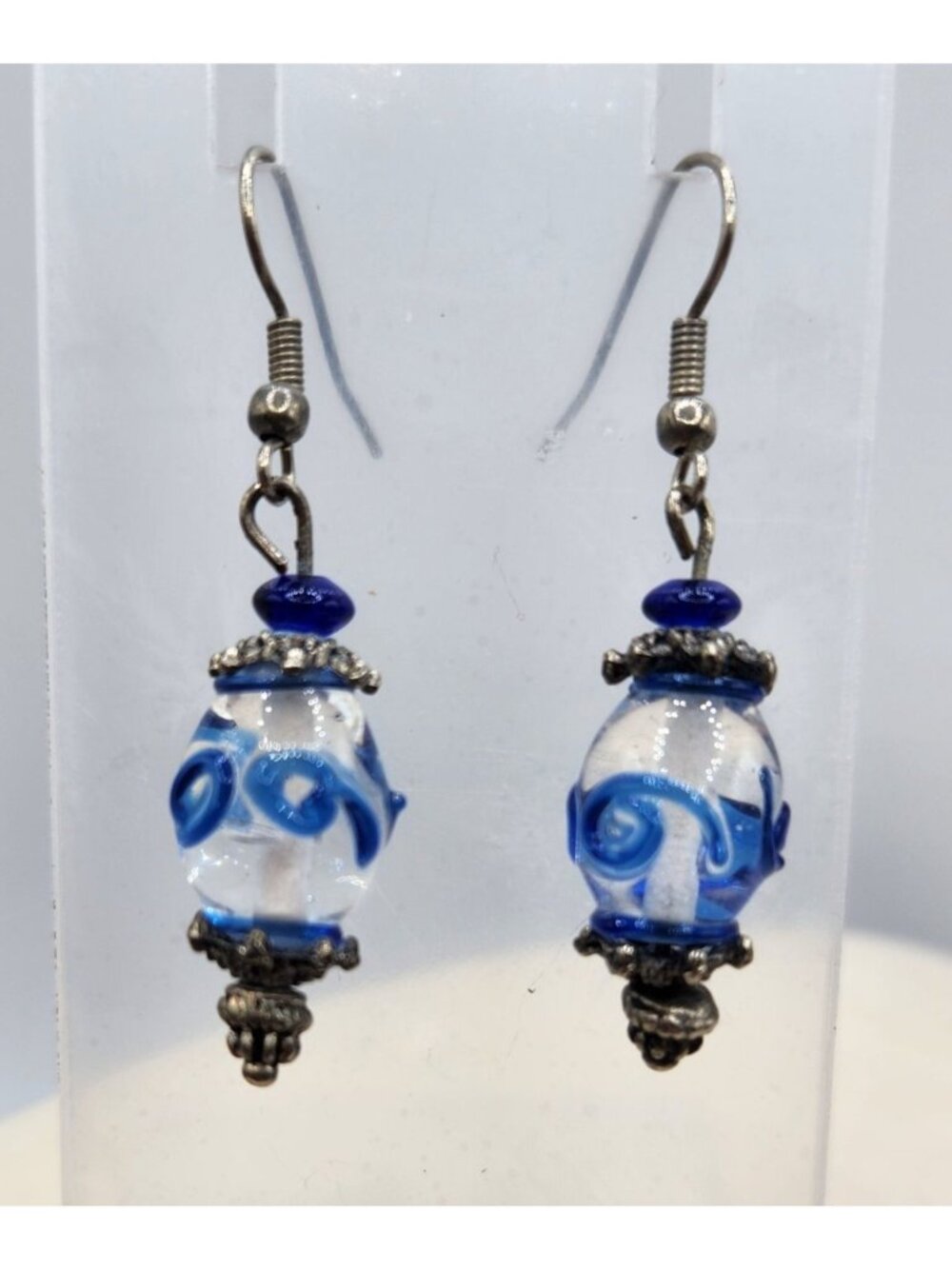 Clear Glass Lampwork Earrings With Blue Swirl Design